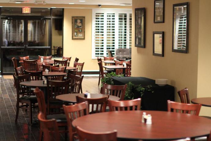 Imagen del bar/restaurante del Hotel Marble Waters Hotel & Suites, Trademark by Wyndham. Foto 3