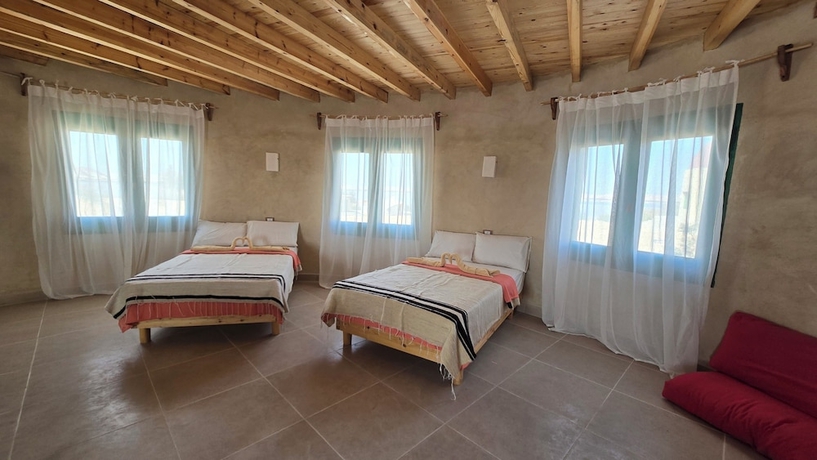 Imagen de la habitación del Hotel Marcelia Eco-Village Front Lake View. Foto 10