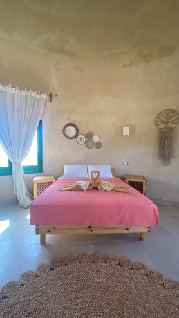 Imagen de la habitación del Hotel Marcelia Eco-Village Front Lake View. Foto 14