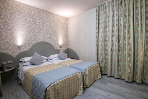 Imagen de la habitación del Hotel Marchi. Foto 8