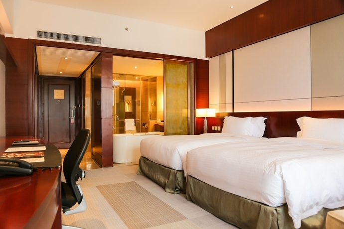 Imagen de la habitación del Hotel Marco Polo Jinjiang. Foto 3