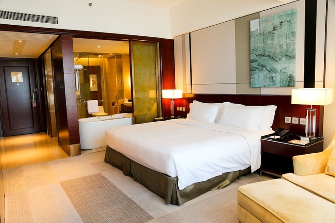 Imagen de la habitación del Hotel Marco Polo Jinjiang. Foto 10