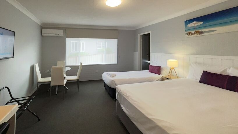Imagen de la habitación del Hotel Marco Polo Motor Inn. Foto 29