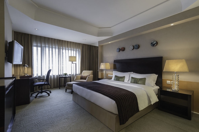 Imagen de la habitación del Hotel Marco Polo Parkside Beijing. Foto 9