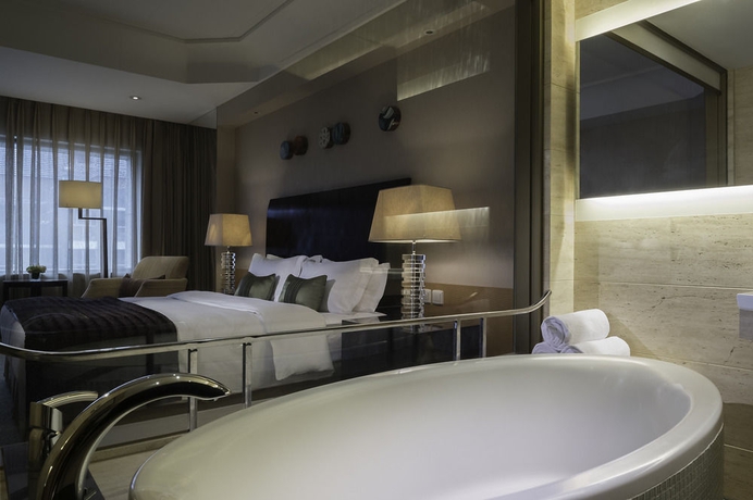 Imagen de la habitación del Hotel Marco Polo Parkside Beijing. Foto 11