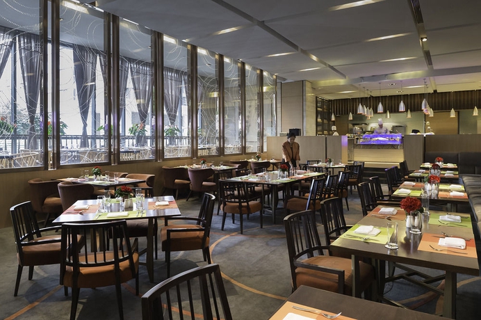 Imagen del bar/restaurante del Hotel Marco Polo Parkside Beijing. Foto 6