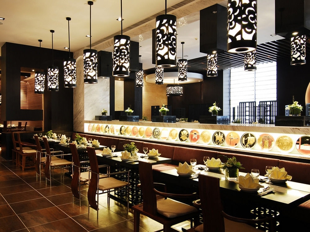 Imagen del bar/restaurante del Hotel Marco Polo Parkside Beijing. Foto 7