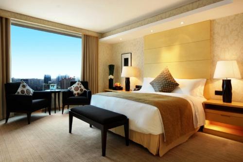 Imagen de la habitación del Hotel Marco Polo Wuhan. Foto 3