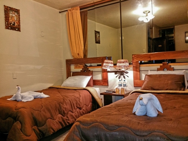 Imagen de la habitación del Hotel Marco Wasi. Foto 5