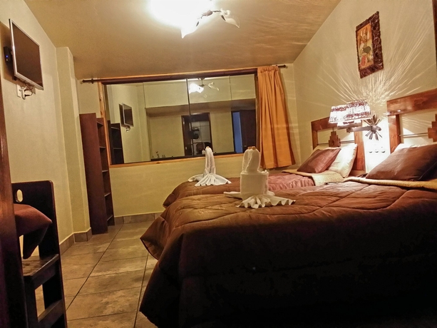 Imagen de la habitación del Hotel Marco Wasi. Foto 13