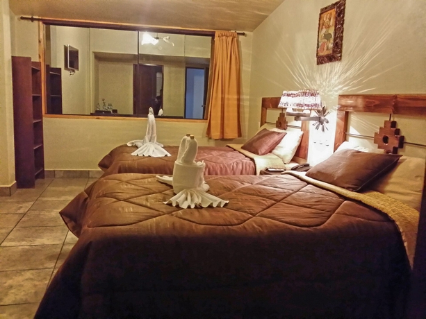 Imagen de la habitación del Hotel Marco Wasi. Foto 14