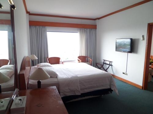 Imagen de la habitación del Hotel Marcopolo & Convention Hall. Foto 8