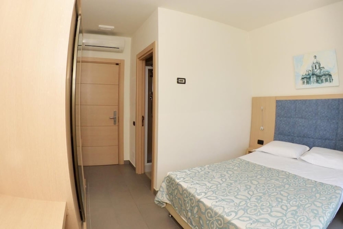 Imagen de la habitación del Hotel Marco's. Foto 14