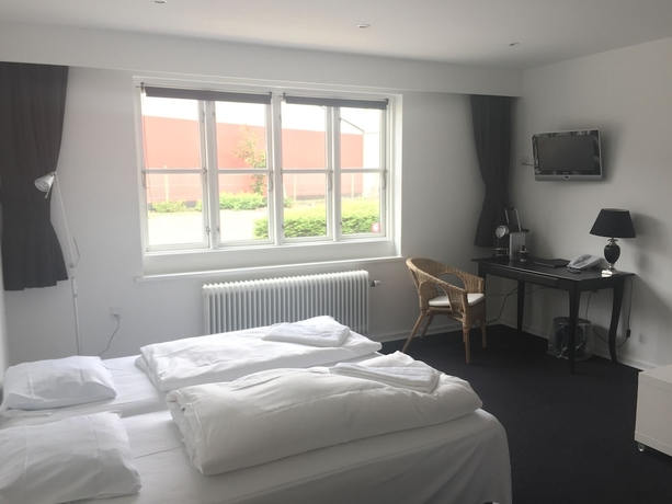 Imagen de la habitación del Hotel Marcussens. Foto 12