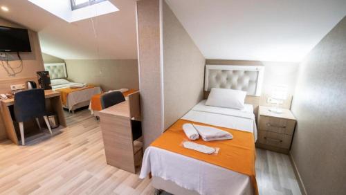 Imagen de la habitación del Hotel Mardy Suit. Foto 11