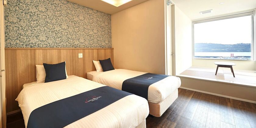 Imagen de la habitación del Hotel Marea Resort Motobu. Foto 19