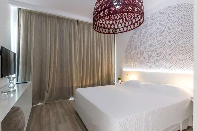 Imagen de la habitación del Hotel Margadina Lounge. Foto 7