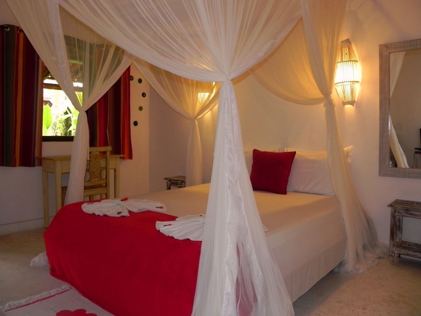 Imagen de la habitación del Hotel Margaridas Boutique - antiga Pousada Jardim das Margaridas. Foto 5