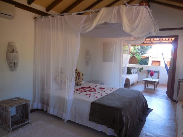 Imagen de la habitación del Hotel Margaridas Boutique - antiga Pousada Jardim das Margaridas. Foto 9