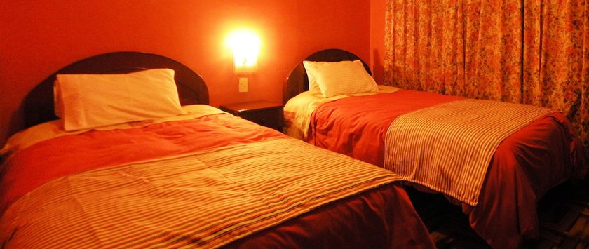 Imagen de la habitación del Hotel Margarita, Puno. Foto 10