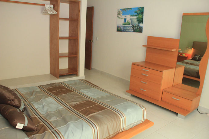 Imagen de la habitación del Hotel Margaritas Penthouse Condo. Foto 10