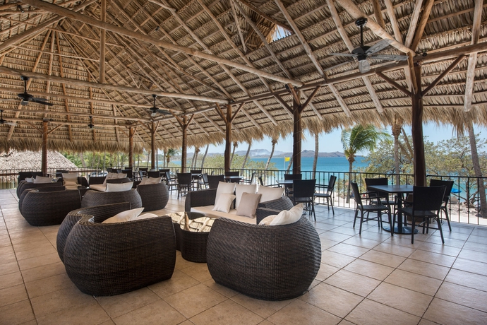 Imagen del bar/restaurante del Hotel Margaritaville Beach Resort Playa Flamingo. Foto 7