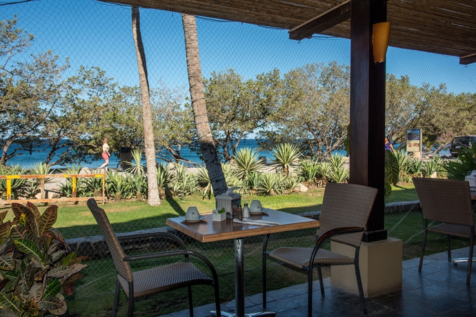 Imagen del bar/restaurante del Hotel Margaritaville Beach Resort Playa Flamingo. Foto 9