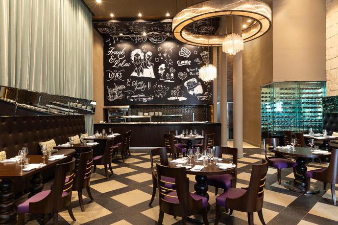 Imagen del bar/restaurante del Hotel Margaritaville Island Reserve Riviera Cancun - All Inclusive by Karisma. Foto 3