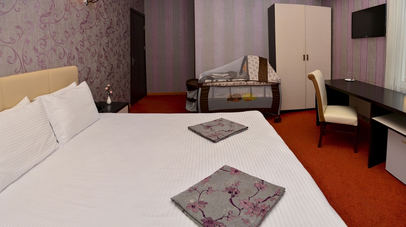 Imagen de la habitación del Hotel Margi Boutique. Foto 16