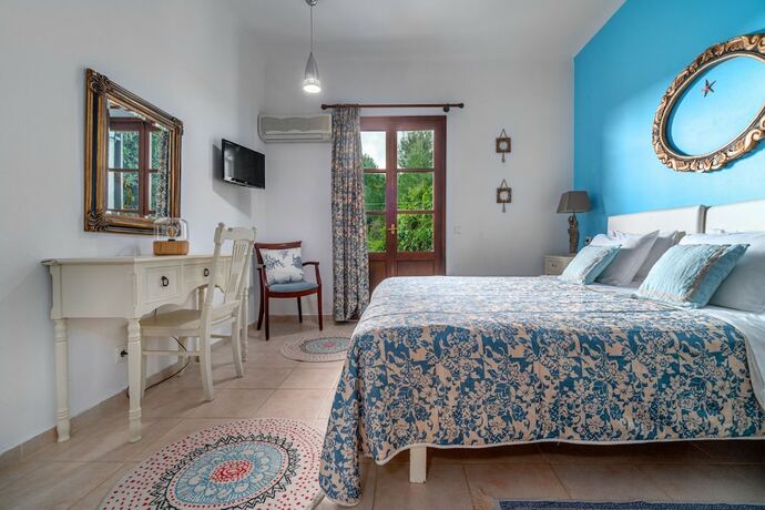 Imagen de la habitación del Hotel Margi House. Foto 13