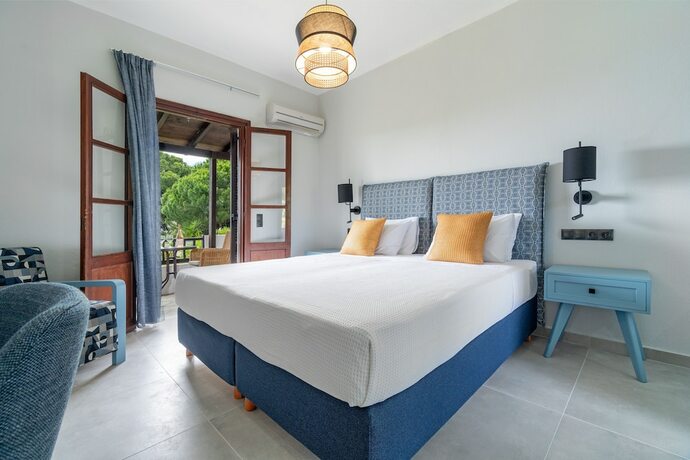 Imagen de la habitación del Hotel Margi House. Foto 16