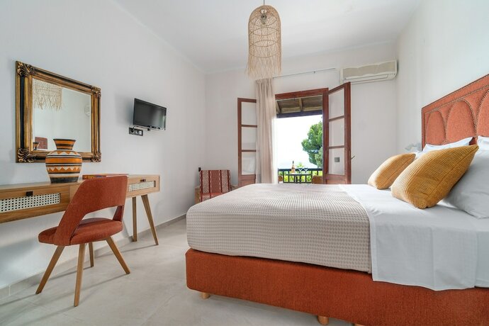 Imagen de la habitación del Hotel Margi House. Foto 17