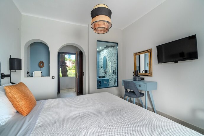 Imagen de la habitación del Hotel Margi House. Foto 19