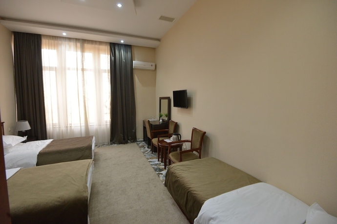 Imagen de la habitación del Hotel Margo Palace. Foto 8