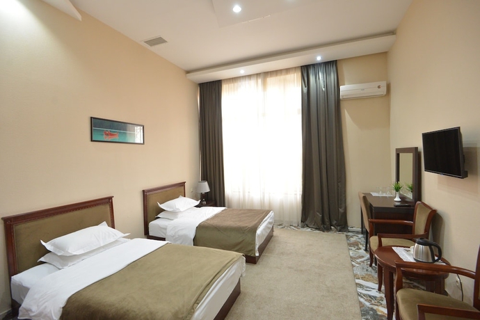 Imagen de la habitación del Hotel Margo Palace. Foto 15