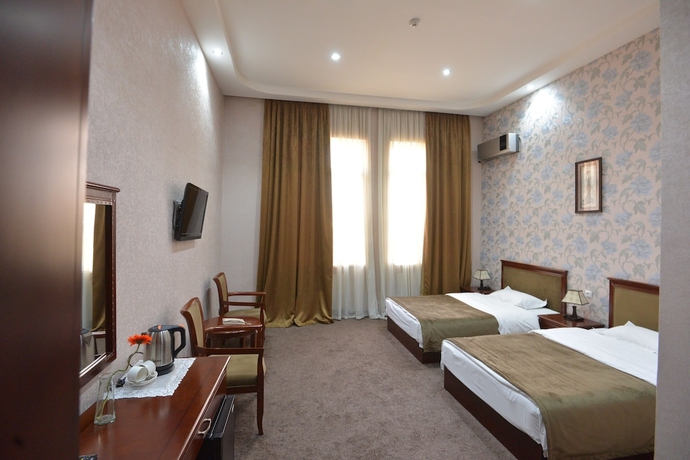 Imagen de la habitación del Hotel Margo Palace. Foto 17