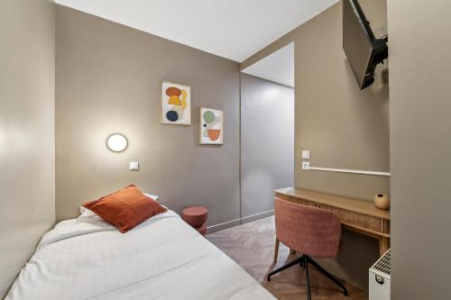 Imagen de la habitación del Hotel Margot, Gare du Nord. Foto 14