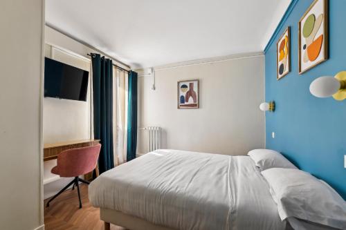 Imagen de la habitación del Hotel Margot, Gare du Nord. Foto 15