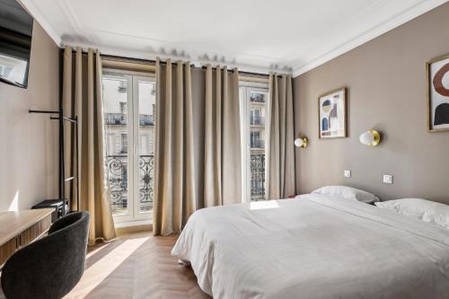 Imagen de la habitación del Hotel Margot, Gare du Nord. Foto 16