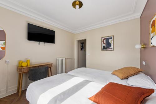 Imagen de la habitación del Hotel Margot, Gare du Nord. Foto 17
