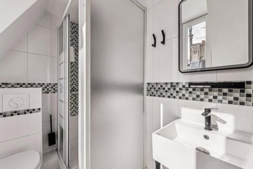 Imagen de la habitación del Hotel Margot, Gare du Nord. Foto 20