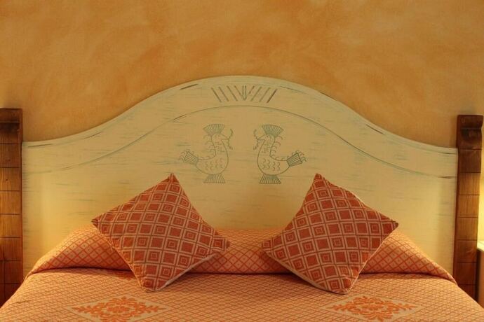 Imagen de la habitación del Hotel Maria Caderina Green Village. Foto 14