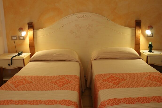 Imagen de la habitación del Hotel Maria Caderina Green Village. Foto 15