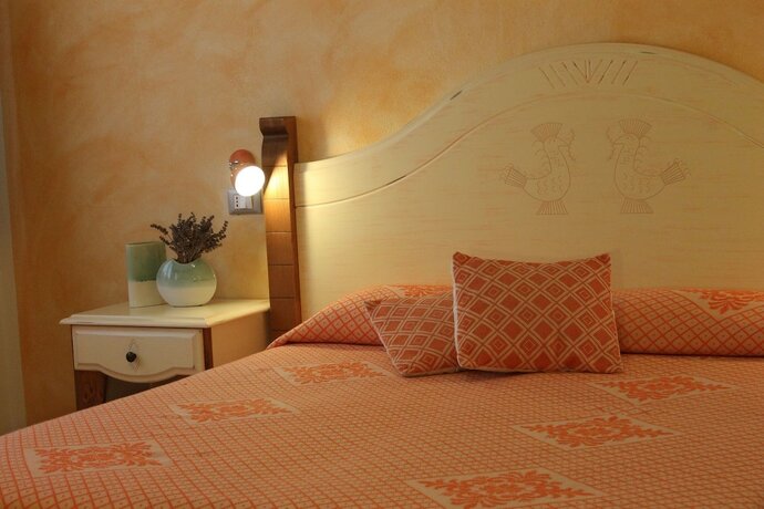 Imagen de la habitación del Hotel Maria Caderina Green Village. Foto 17