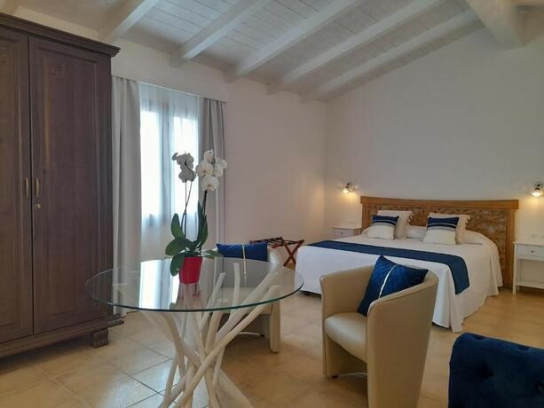 Imagen de la habitación del Hotel Maria Caderina Green Village. Foto 20