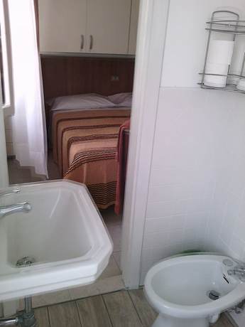 Imagen de la habitación del Hotel Maria Gabriella. Foto 12