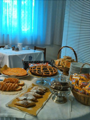Imagen del bar/restaurante del Hotel Maria Gabriella. Foto 4