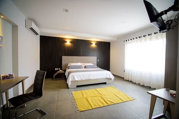 Imagen de la habitación del Hotel Maria Ines Suite. Foto 2