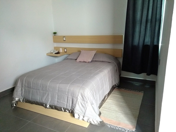 Imagen de la habitación del Hotel Maria Ines Suite. Foto 5