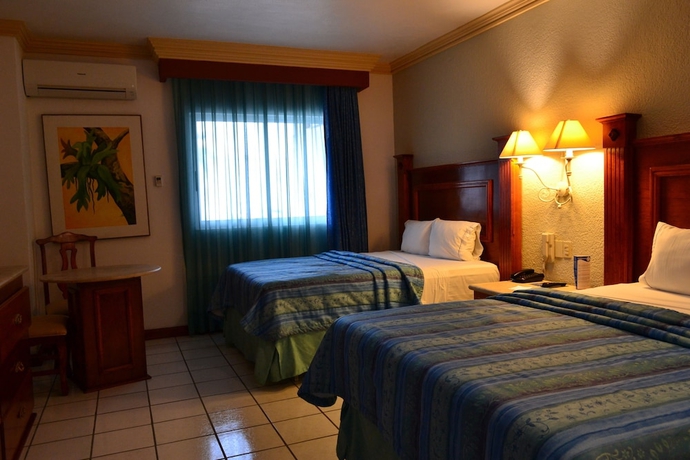 Imagen de la habitación del Hotel Maria Isabel. Foto 13